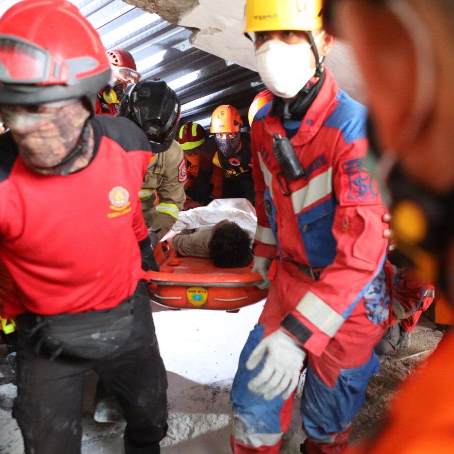 Rescuers turn to heavy machinery as hope fades of finding survivors of Indonesia school collapse